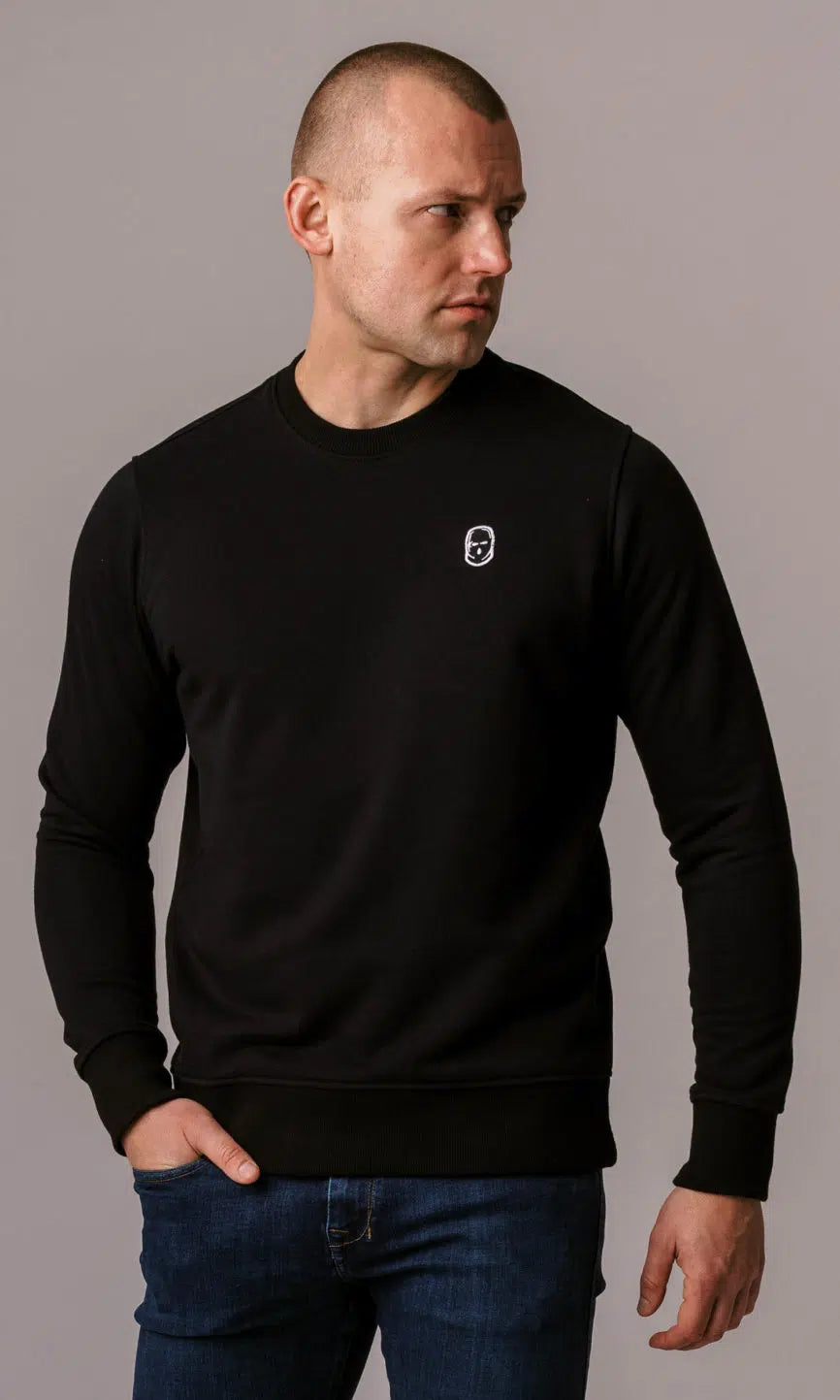 Schwarzes Sweatshirt "Basic" No Respect von PGwear mit gesticktem Patch auf der Brust und NO RESPECT Labetikett im Nacken.